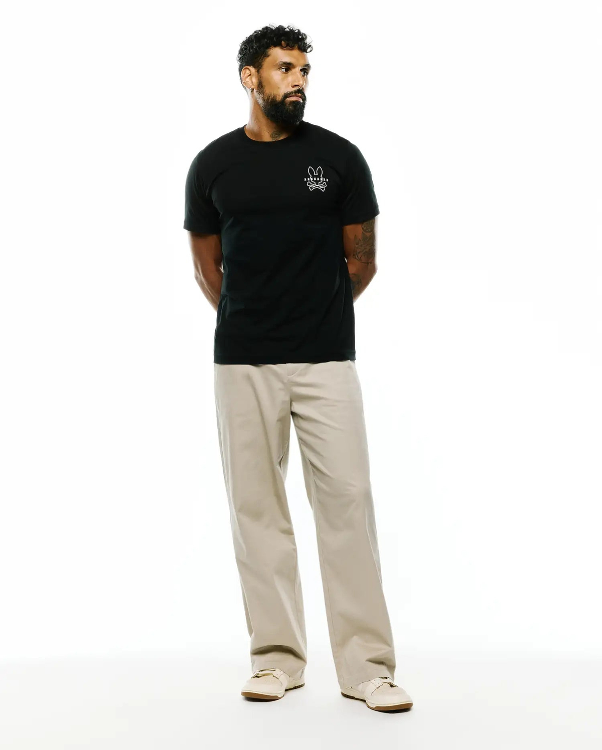 Black Mens Piers Pima Cotton Back Graphic Tee, a classic fit jersey t-shirt with a small white embroidered Psycho Bunny skull logo on the left chest.