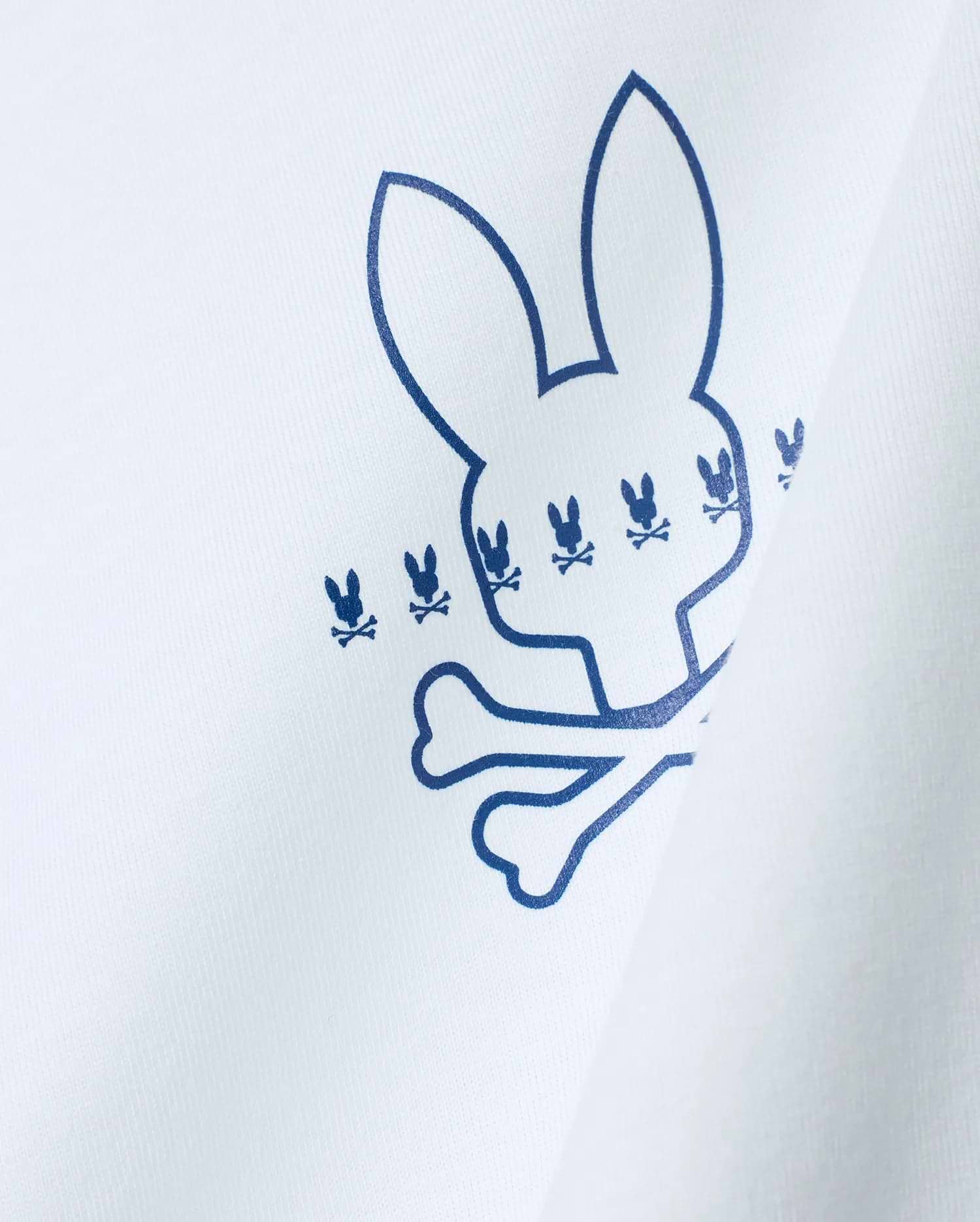 White Mens Piers Pima Cotton Back Graphic Tee with a large blue outline Psycho Bunny skull logo, detailed with smaller repeating blue bunny skull graphics on soft Pima cotton jersey.