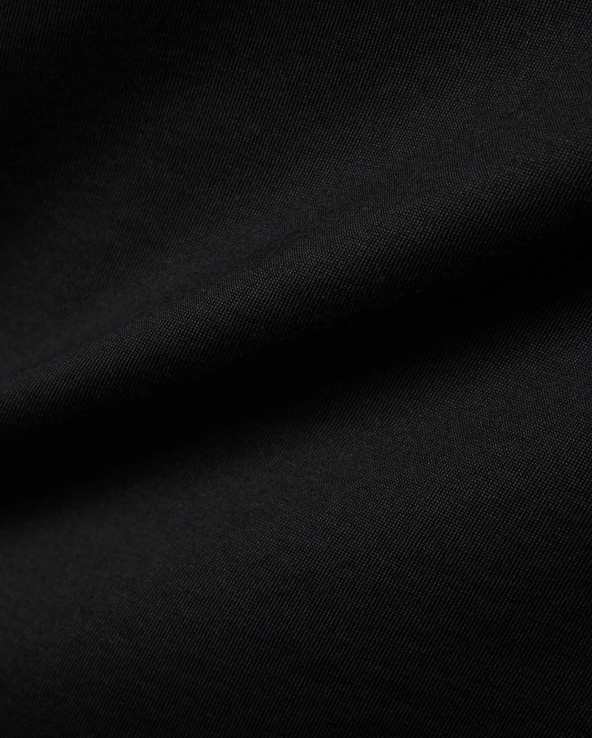 Mens Jaydon Wordmark Graphic Tee in classic black, crafted from soft jersey knit fabric with a subtle diagonal texture, featuring a bold wordmark graphic.