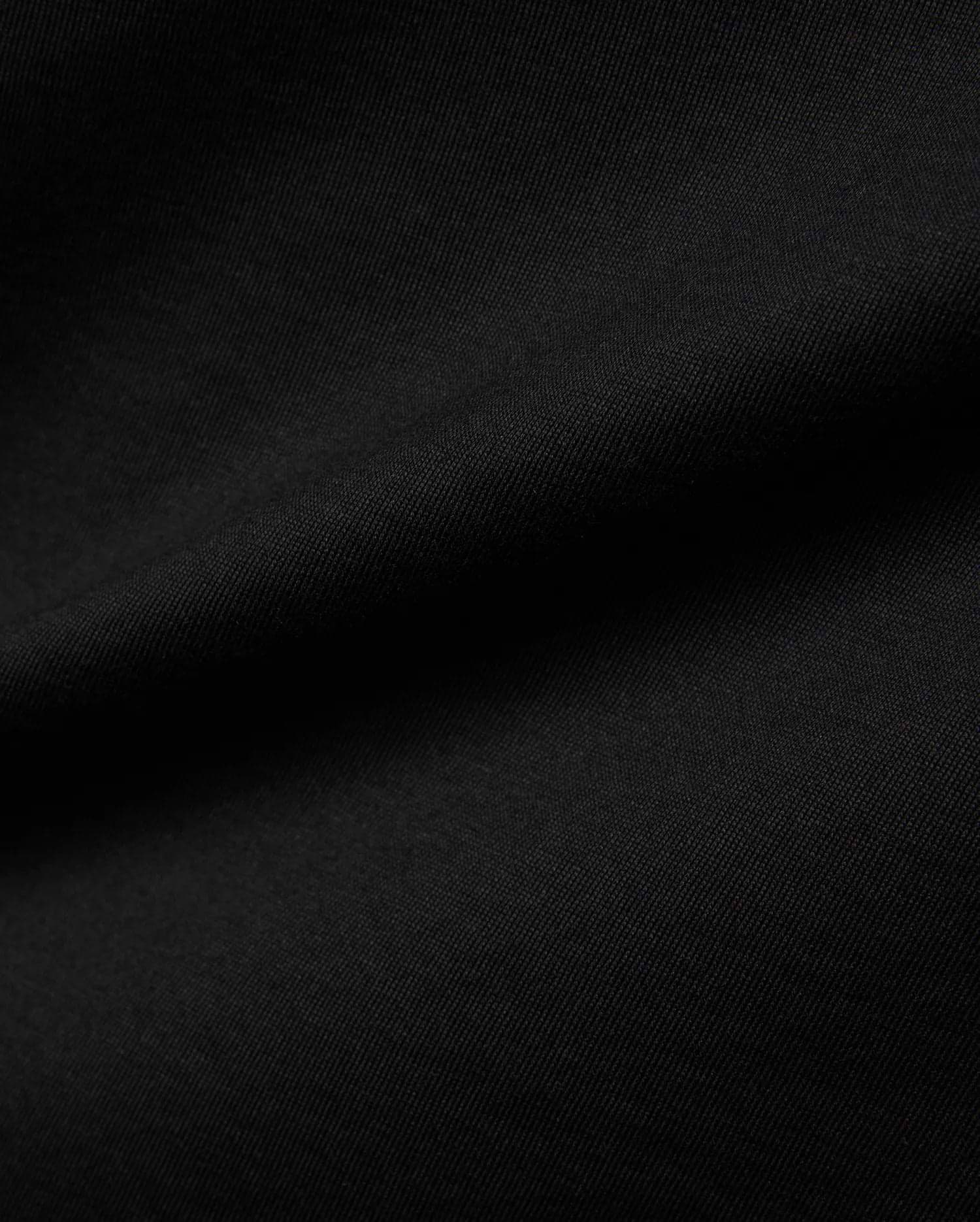 Mens Jaydon Wordmark Graphic Tee in classic black, crafted from soft jersey knit fabric with a subtle diagonal texture, featuring a bold wordmark graphic.