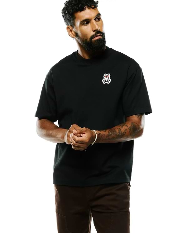 Black Mens Jaydon Pima Cotton Oversized-Fit Tee, a smooth jersey knit, featuring a small, embroidered white and red Psycho Bunny skull logo on the left chest in an oversized-fit.