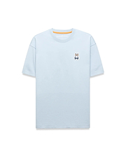 Light blue Mens Jaydon Relaxed Fit Tee in soft jersey, featuring a small embroidered Psycho Bunny skull logo on the left chest and orange neck tape.