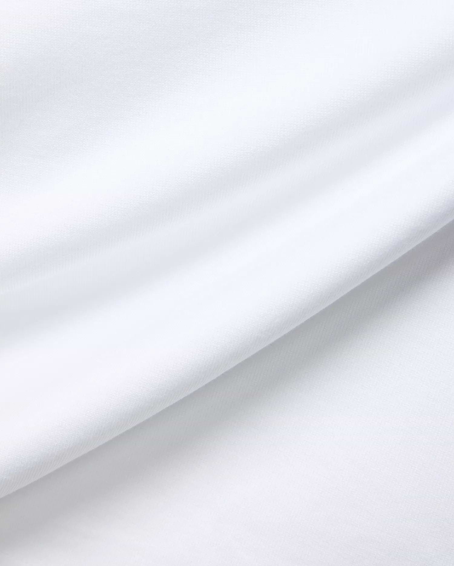 White MENS JAYDON RELAXED FIT TEE, a premium Psycho Bunny garment crafted from soft, breathable jersey fabric, showcasing subtle texture and gentle folds for ultimate comfort.