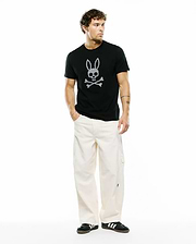 Mens Stan Graphic Tee, a black classic fit jersey t-shirt featuring a prominent white Psycho Bunny skull and crossbones graphic print on the center chest.
