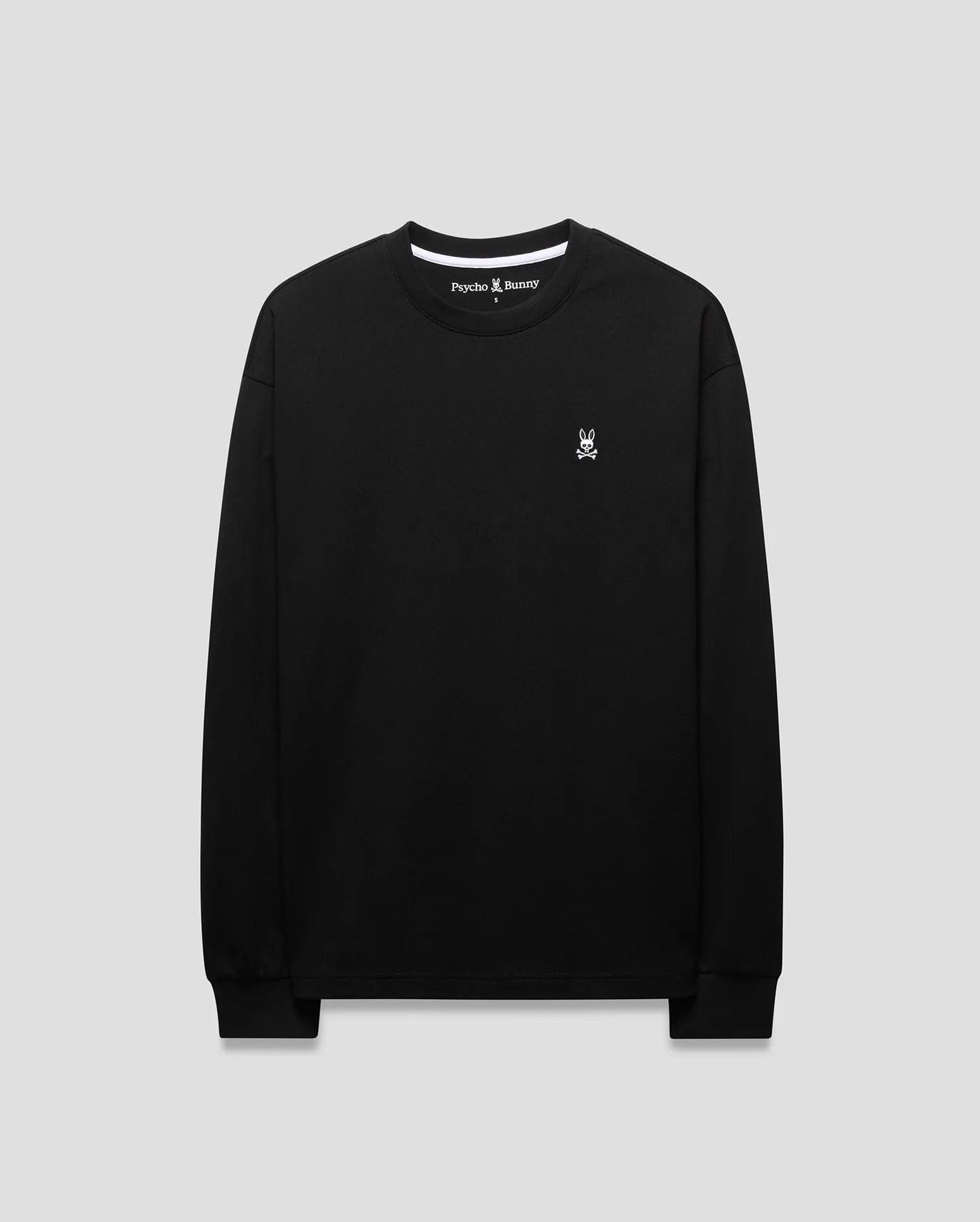 Mens Norman Long Sleeve Oversized Fit Tee in black jersey knit, featuring a small white embroidered Psycho Bunny skull logo on the left chest and white branded inner neck tape.