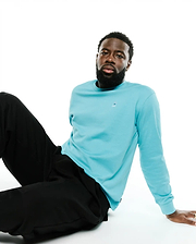 Men's Norman Longsleeve Oversized Tee in aqua blue, featuring a smooth jersey knit and a small embroidered Psycho Bunny skull logo on the left chest. (3)