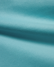 Men's Norman Longsleeve Oversized Tee in a vibrant aqua hue, highlighting the premium, soft jersey knit fabric with a smooth, comfortable texture and subtle draping. (6)