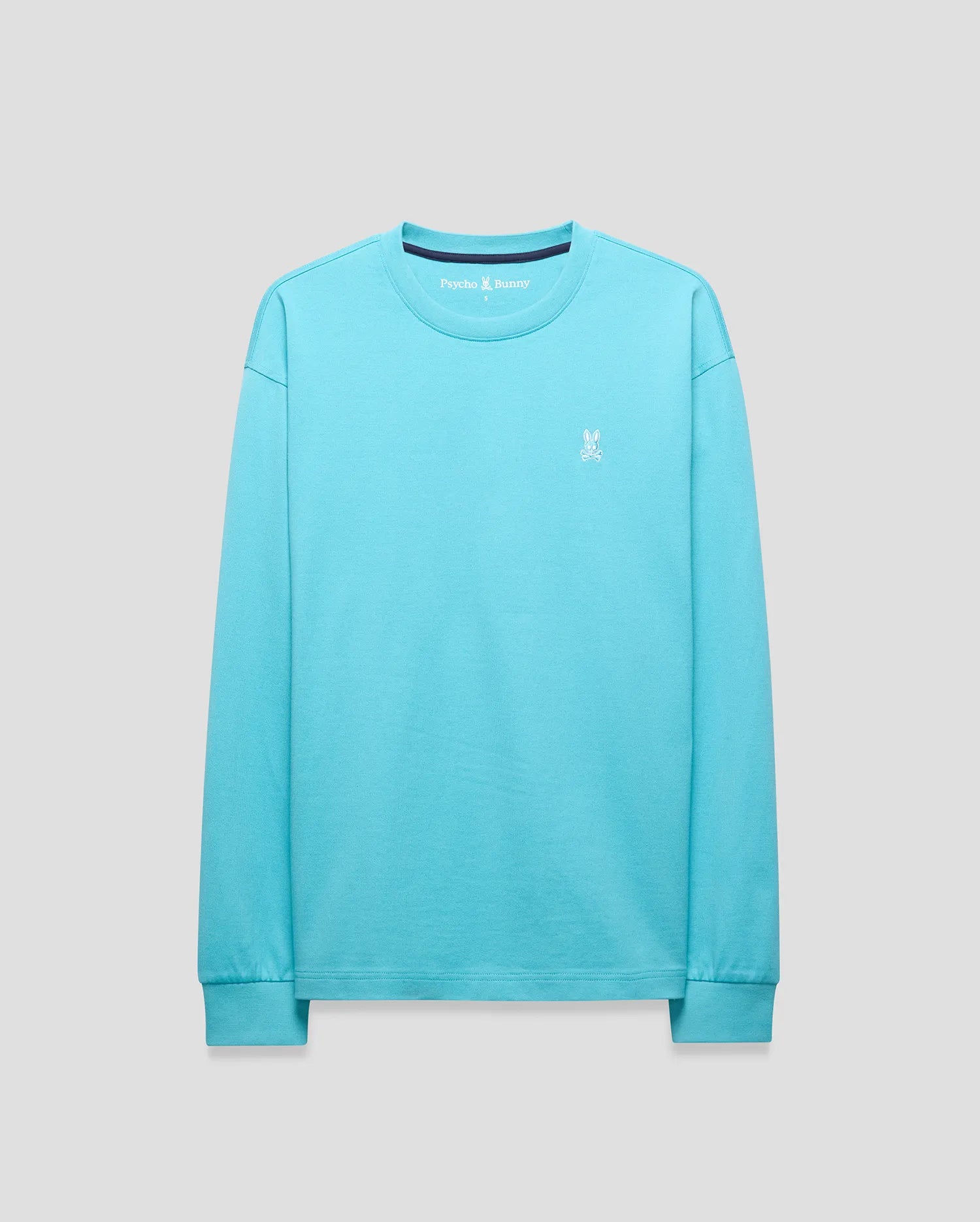 Mens Norman Long Sleeve Relaxed Fit Tee in vibrant aqua jersey knit, featuring a small white embroidered Psycho Bunny skull logo on the left chest, ribbed cuffs, and a navy inner collar.