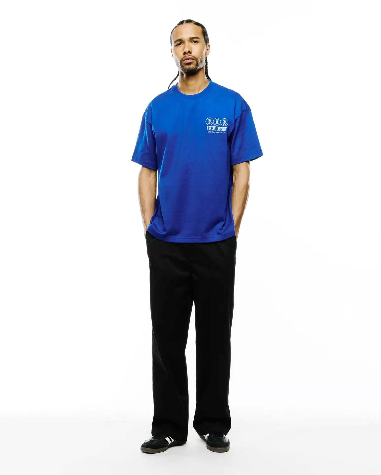 Royal blue Mens Nathaniel Relaxed Fit Tee in smooth jersey, featuring a small white embroidered Psycho Bunny logo with three bunny skulls and New York - Since 2005 text on the left chest.