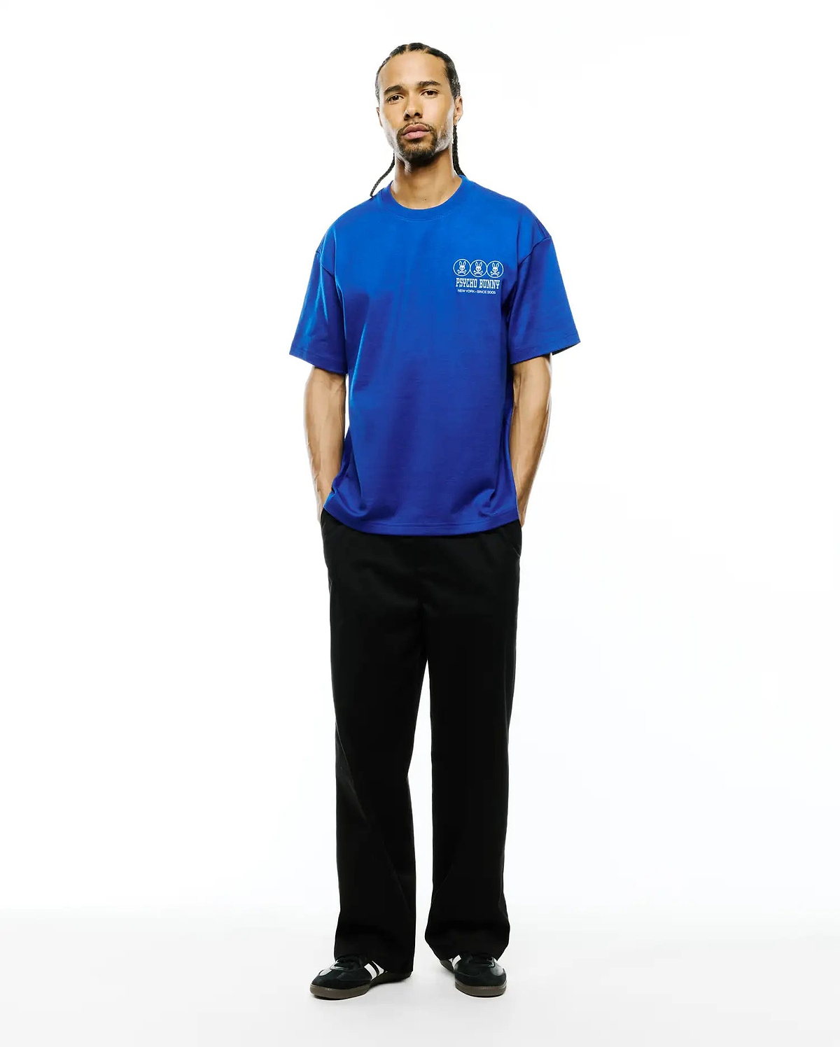 Royal blue Mens Nathaniel Relaxed Fit Tee in smooth jersey, featuring a small white embroidered Psycho Bunny logo with three bunny skulls and New York - Since 2005 text on the left chest.