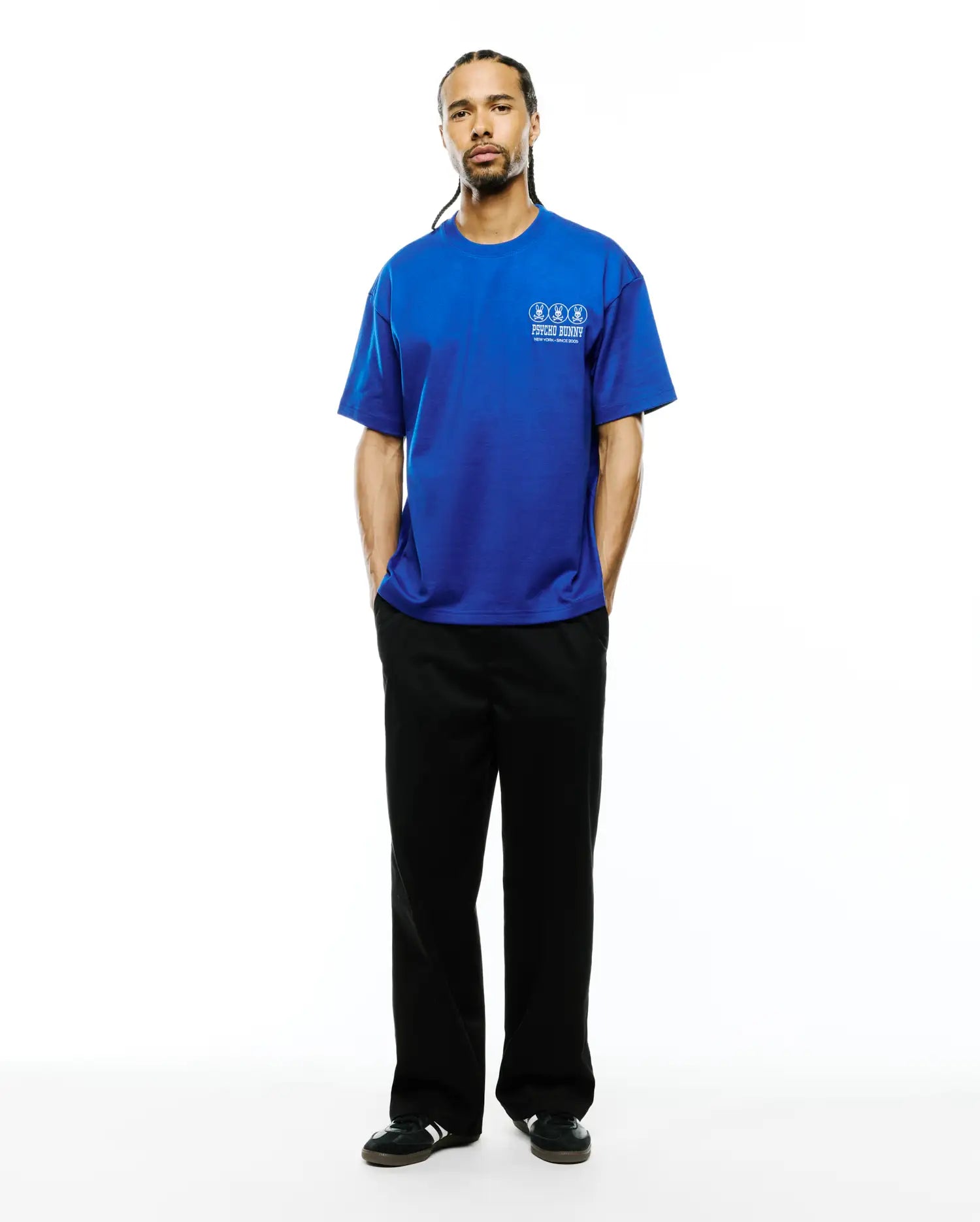 Royal blue Mens Nathaniel Relaxed Fit Tee in smooth jersey, featuring a small white embroidered Psycho Bunny logo with three bunny skulls and New York - Since 2005 text on the left chest.