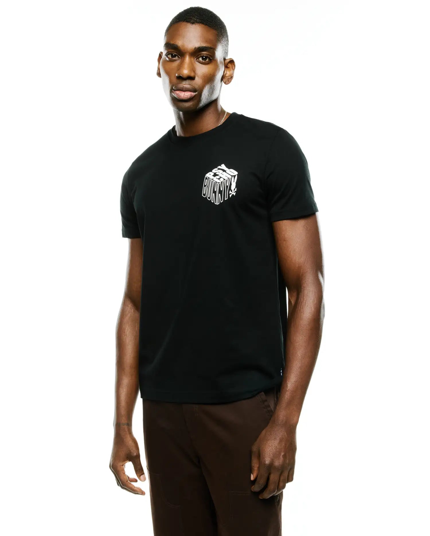 Men's Conan Pima Back Graphic Tee, a black Pima cotton jersey t-shirt with a classic fit and a small white stylized Psycho Bunny block graphic on the left chest.