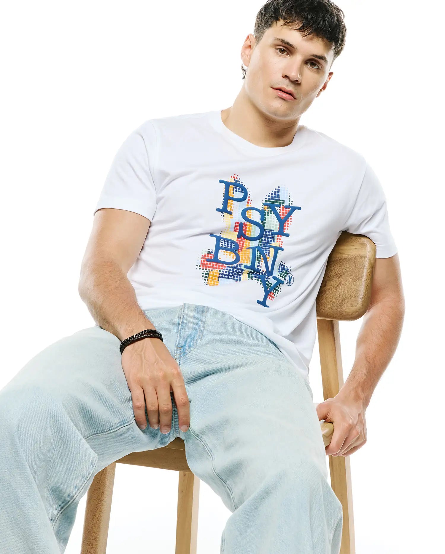 Mens Wes Graphic Tee, white classic fit smooth jersey knit with a large colorful pixelated PSYBNY chest graphic and small embroidered Psycho Bunny skull logo.