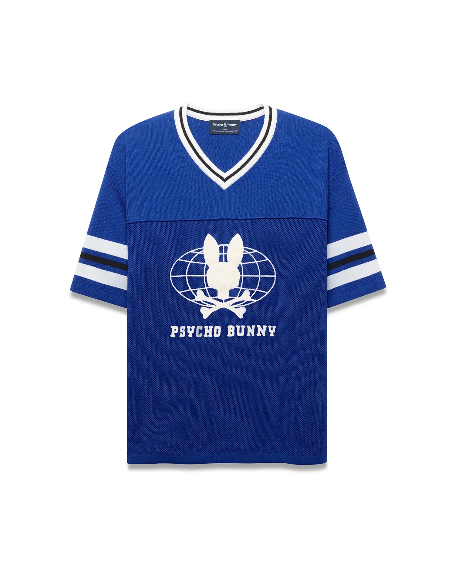 Royal blue Mens Mike Knit Graphic Jersey, relaxed fit, with white/black striped knit V-neck and sleeves. Features a large white Psycho Bunny skull globe graphic and text on the mesh-textured chest. (6)