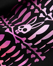 MENS LEWIS GRAPHIC TEE. Black jersey knit fabric with a bold, all-over pink and purple gradient print of stylized bones and the iconic Psycho Bunny skull and crossbones logo.