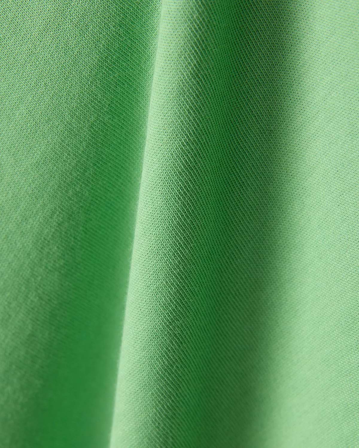 Mens Joji Wordmark Graphic Tee in a vibrant, eye-catching lime green jersey knit fabric, showcasing a fine, soft texture with subtle diagonal ribbing and elegant, flowing folds. (6)