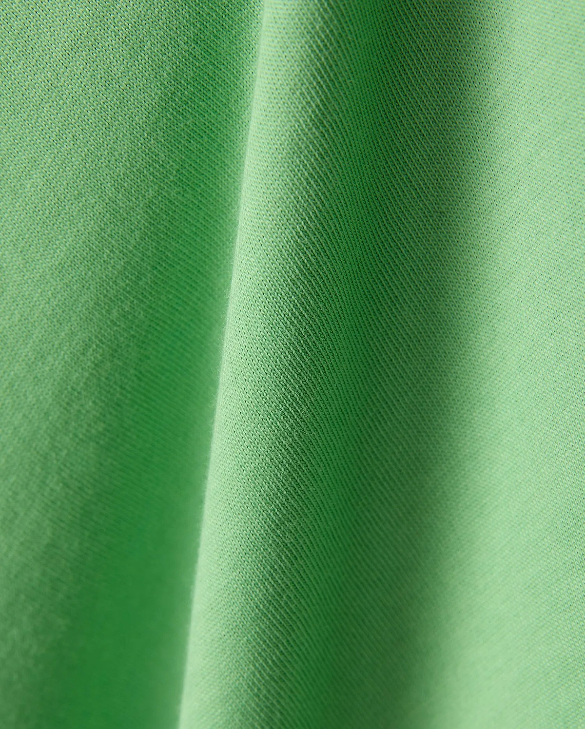 Mens Joji Wordmark Graphic Tee in a vibrant, eye-catching lime green jersey knit fabric, showcasing a fine, soft texture with subtle diagonal ribbing and elegant, flowing folds. (6)