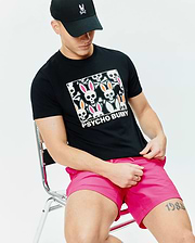 Black Mens Byron Graphic Tee in classic fit jersey, featuring a large chest graphic of white bunny skulls with pink and orange ears, crossbones, and Psycho Bunny text. (2)