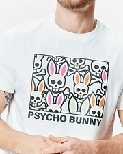 Mens Byron Graphic Tee, white classic fit jersey t-shirt with a large chest graphic of colorful bunny skulls, crossbones, and PSYCHO BUNNY text. (3)