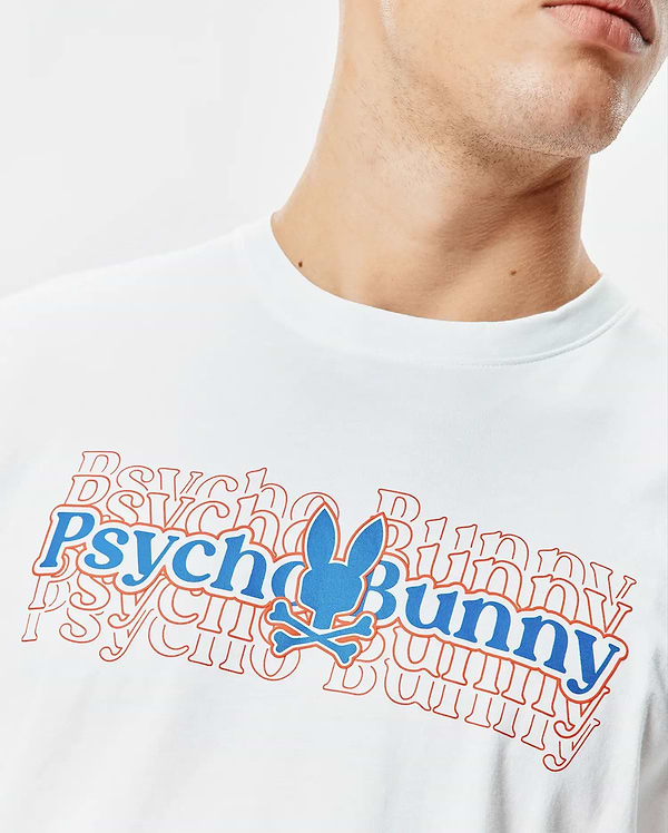 White Mens John Back Graphic Tee, a classic fit jersey t-shirt featuring a large central blue and orange Psycho Bunny text graphic with a layered effect and the iconic bunny skull logo.