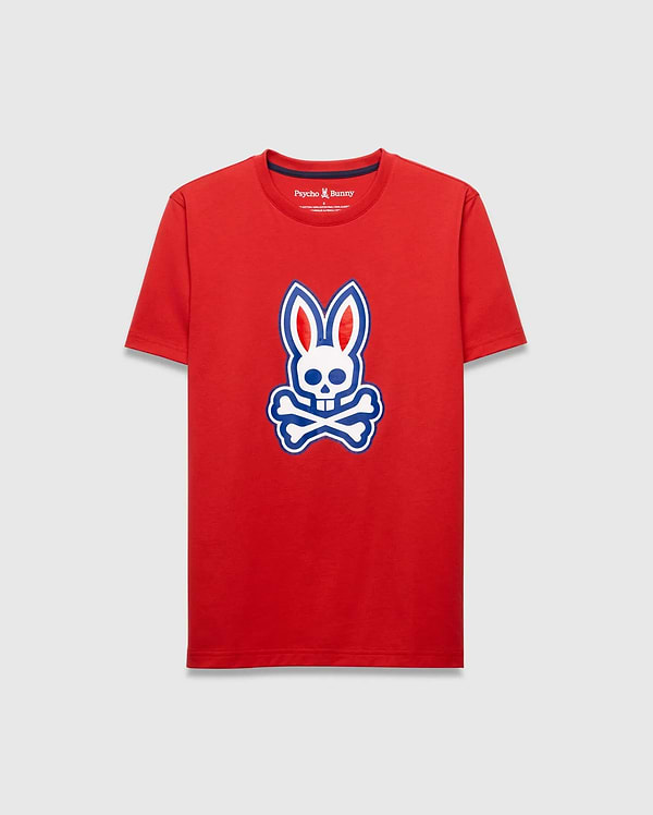 Mens John Graphic Tee, a vibrant red classic fit jersey knit t-shirt, showcasing a prominent centered white and blue Psycho Bunny skull logo graphic.