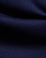 Mens John Graphic Tee, a premium Psycho Bunny dark navy blue t-shirt, showcasing its refined, soft, finely textured jersey knit fabric with elegant, flowing folds, perfect for refined streetwear.