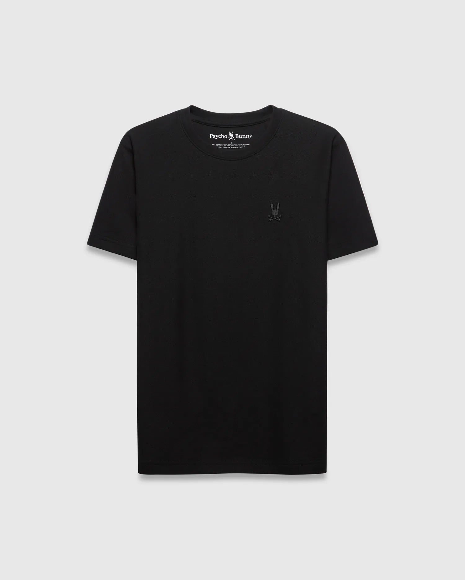 Mens Taylor Pique Tee, a classic fit black t-shirt crafted from pique fabric, featuring a small, tonal embroidered Psycho Bunny skull logo on the left chest.