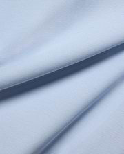 Light blue Mens Taylor Pique Tee fabric, a detailed close-up showcasing the premium, breathable textured pique knit, ideal for bold Psycho Bunny streetwear.
