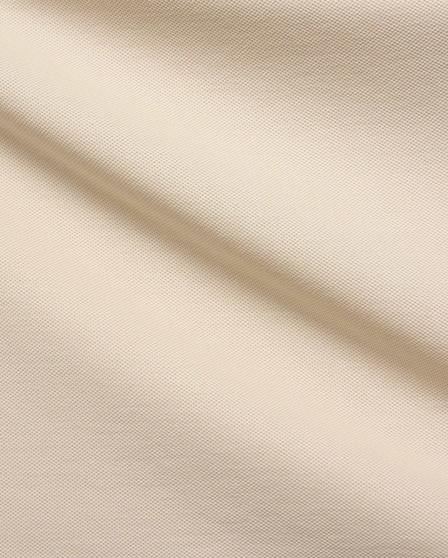 Mens Taylor Pique Tee in a premium light beige pique fabric, showcasing its refined texture and subtle weave, perfect for elevated casual wear and modern streetwear style.