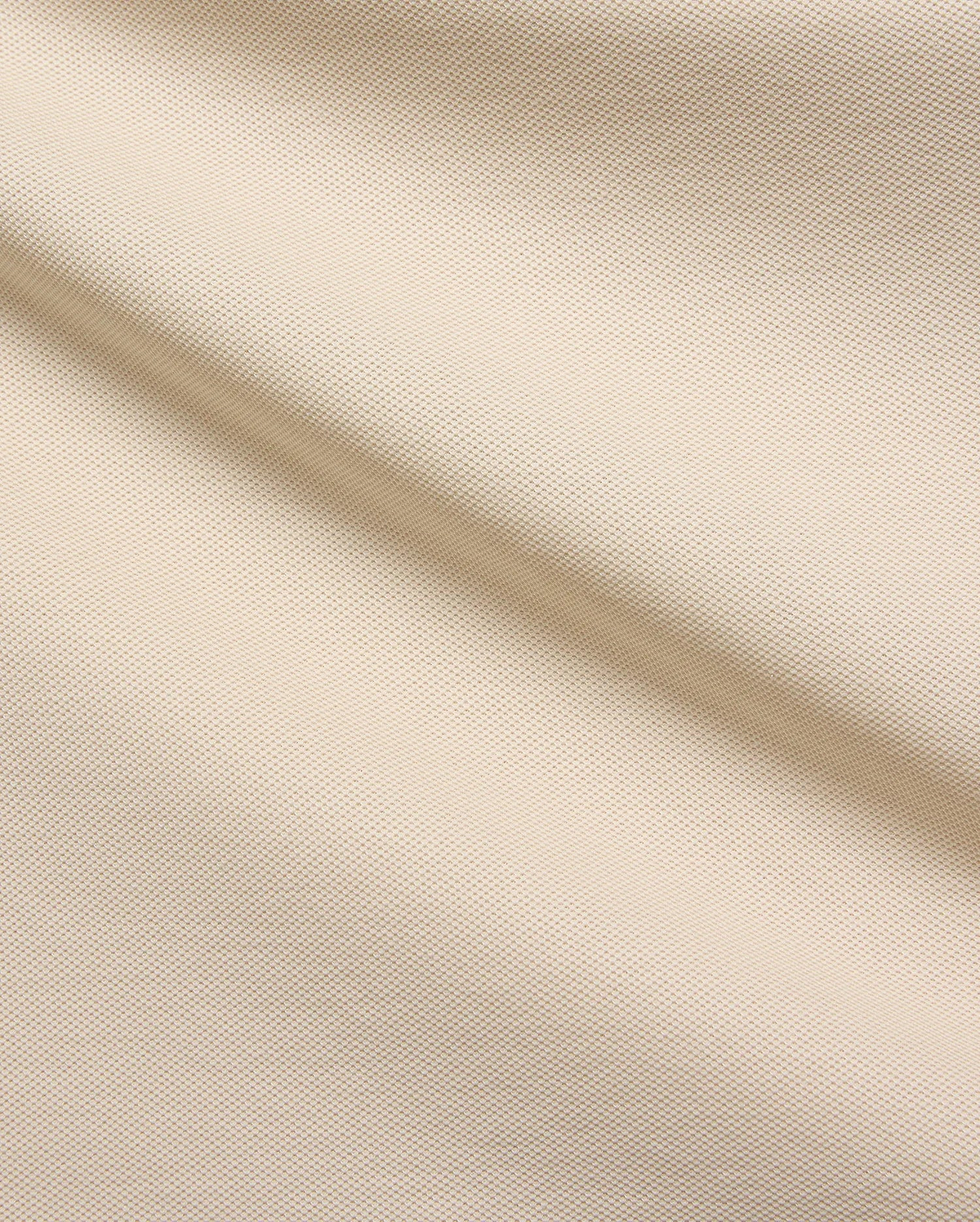 Mens Taylor Pique Tee in a premium light beige pique fabric, showcasing its refined texture and subtle weave, perfect for elevated casual wear and modern streetwear style.