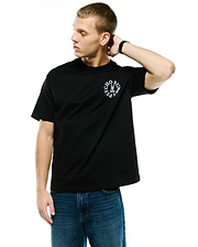 Black Mens Olek Relaxed Back Graphic Tee, crafted from smooth jersey fabric, featuring a prominent white circular Psycho Bunny skull logo graphic on the left chest. (3)