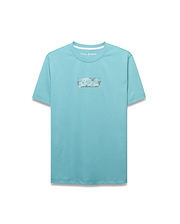 Men's Alfie Back Graphic Tee. Classic fit aqua jersey t-shirt featuring a large rectangular front chest graphic with a repeating white, grey, and black Psycho Bunny skull pattern. Small logo at back neck. (5)
