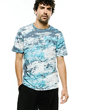 Men's Alfie All-Over Jacquard Tee, a classic fit knit t-shirt in white, light blue, and dark grey abstract pattern, featuring a small embroidered Psycho Bunny skull logo on the left chest. (3)