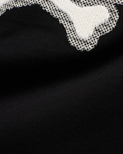 Men's Samson Graphic Tee: Black jersey knit with a large white textured graphic featuring a distinctive white cross-stitch outline, showcasing the iconic Psycho Bunny design. (6)