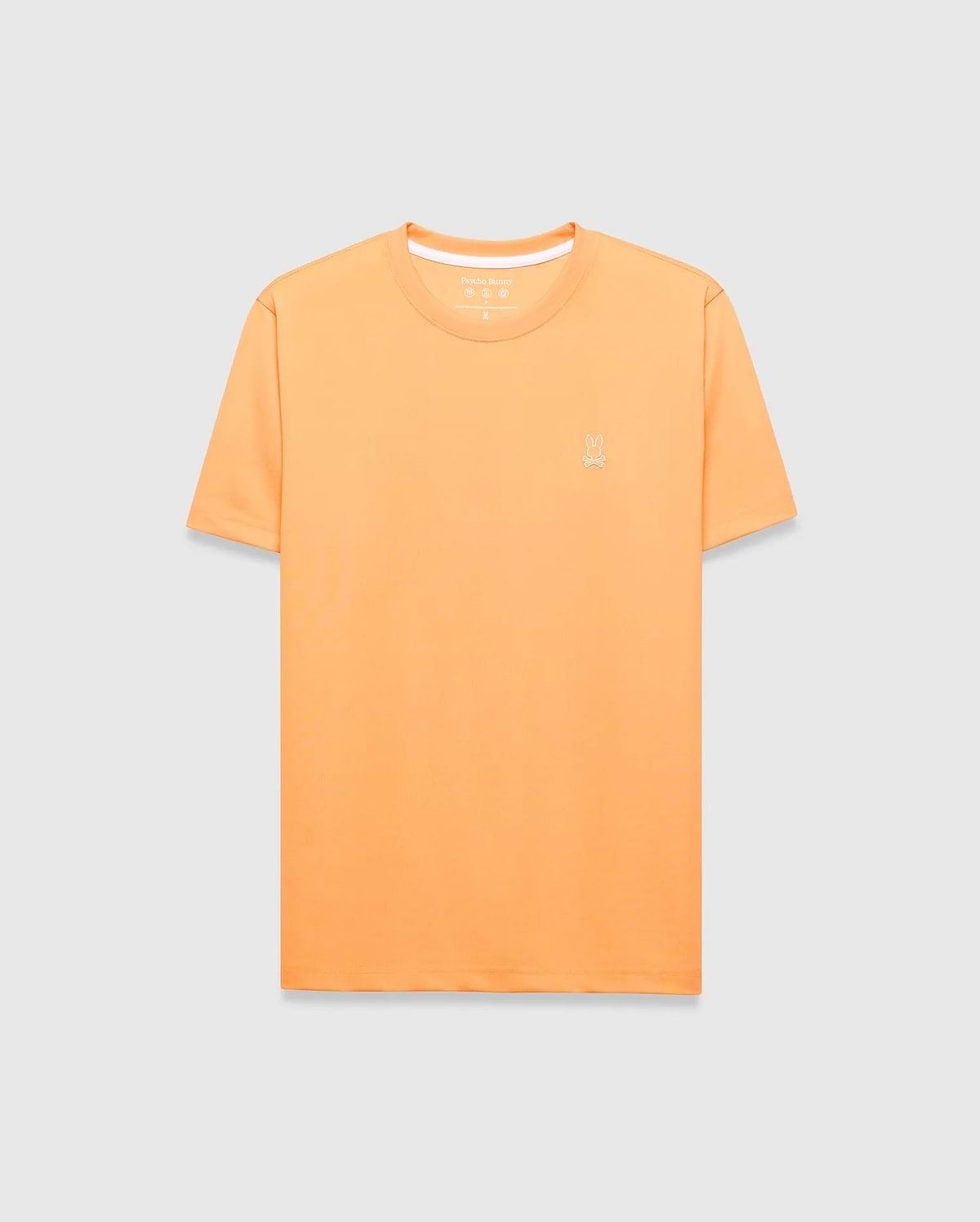 Mens Dash Bunny Sport Tee, a classic fit orange t-shirt made from smooth performance fabric, featuring a small white embroidered Psycho Bunny skull logo on the left chest and white inner collar trim. (5)