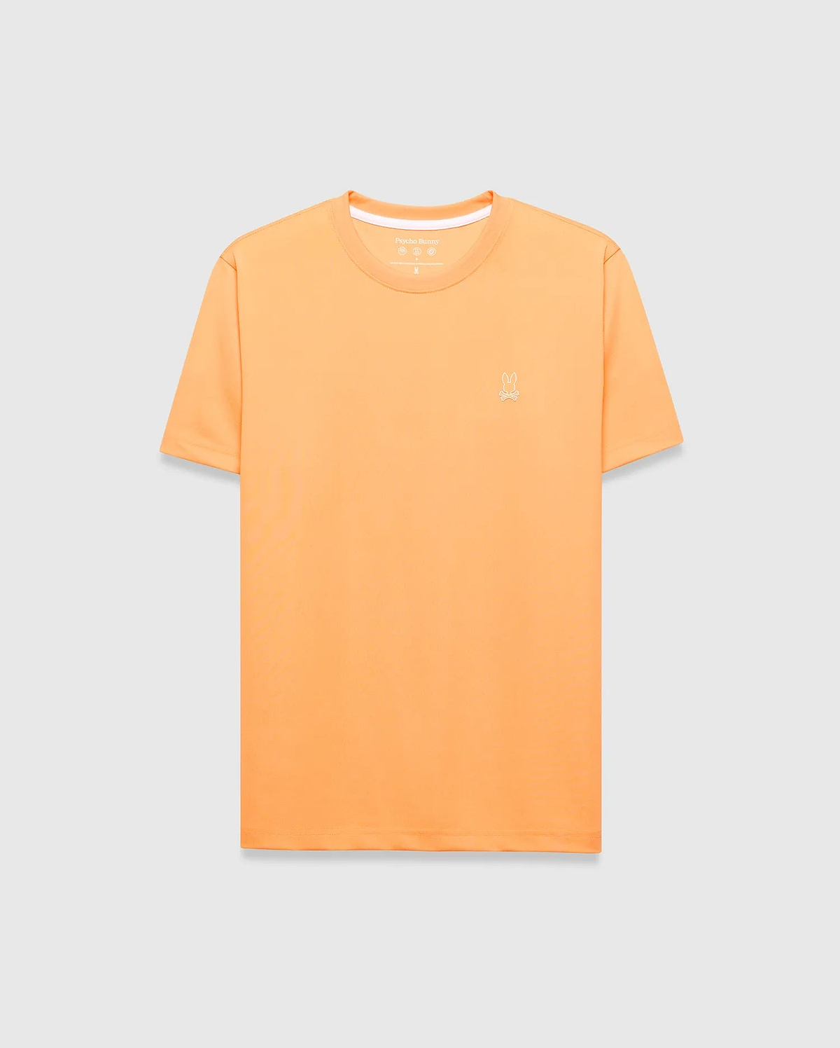 Mens Dash Bunny Sport Tee, a classic fit orange t-shirt made from smooth performance fabric, featuring a small white embroidered Psycho Bunny skull logo on the left chest and white inner collar trim. (5)