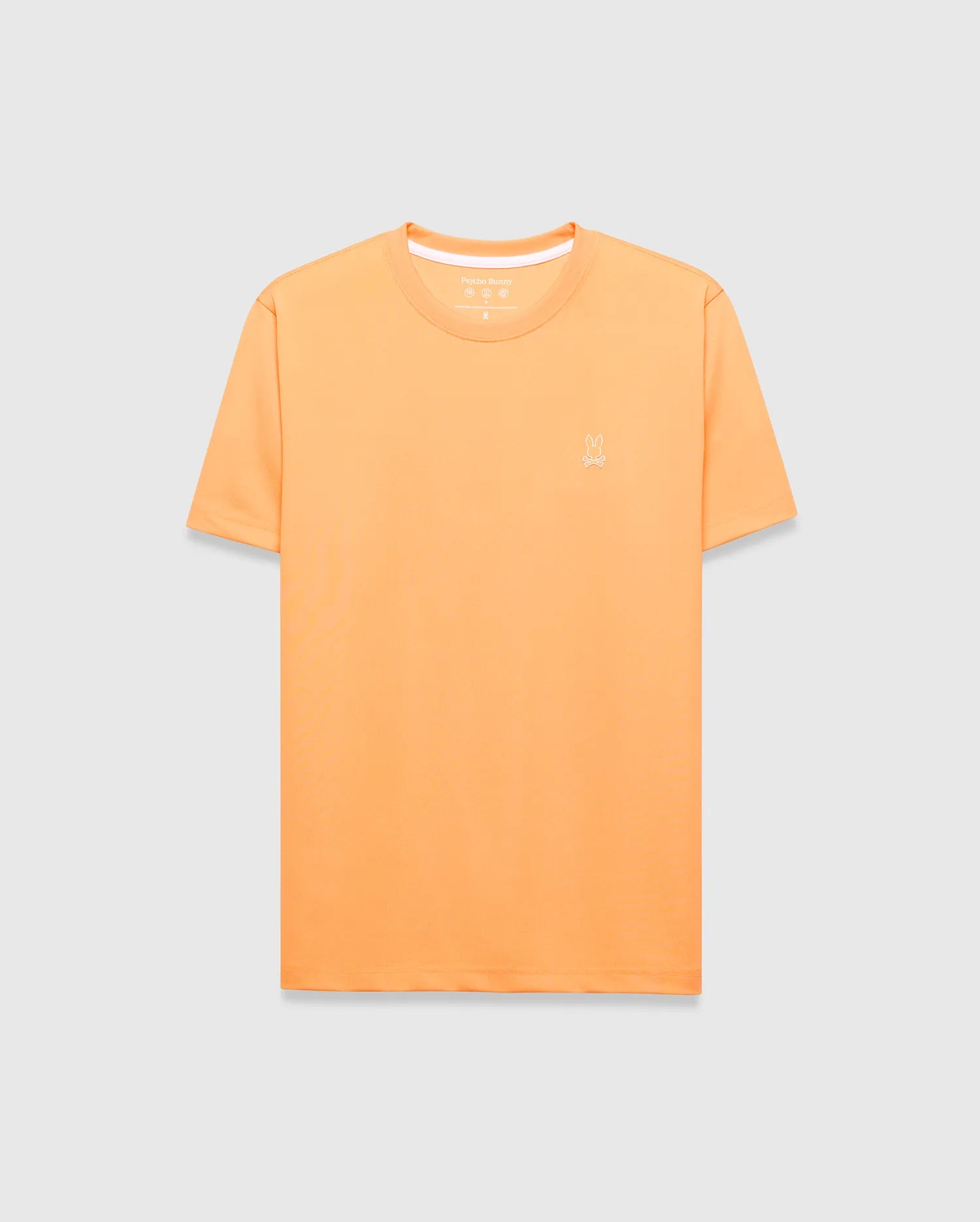 Mens Dash Bunny Sport Tee, a classic fit orange t-shirt made from smooth performance fabric, featuring a small white embroidered Psycho Bunny skull logo on the left chest and white inner collar trim. (5)