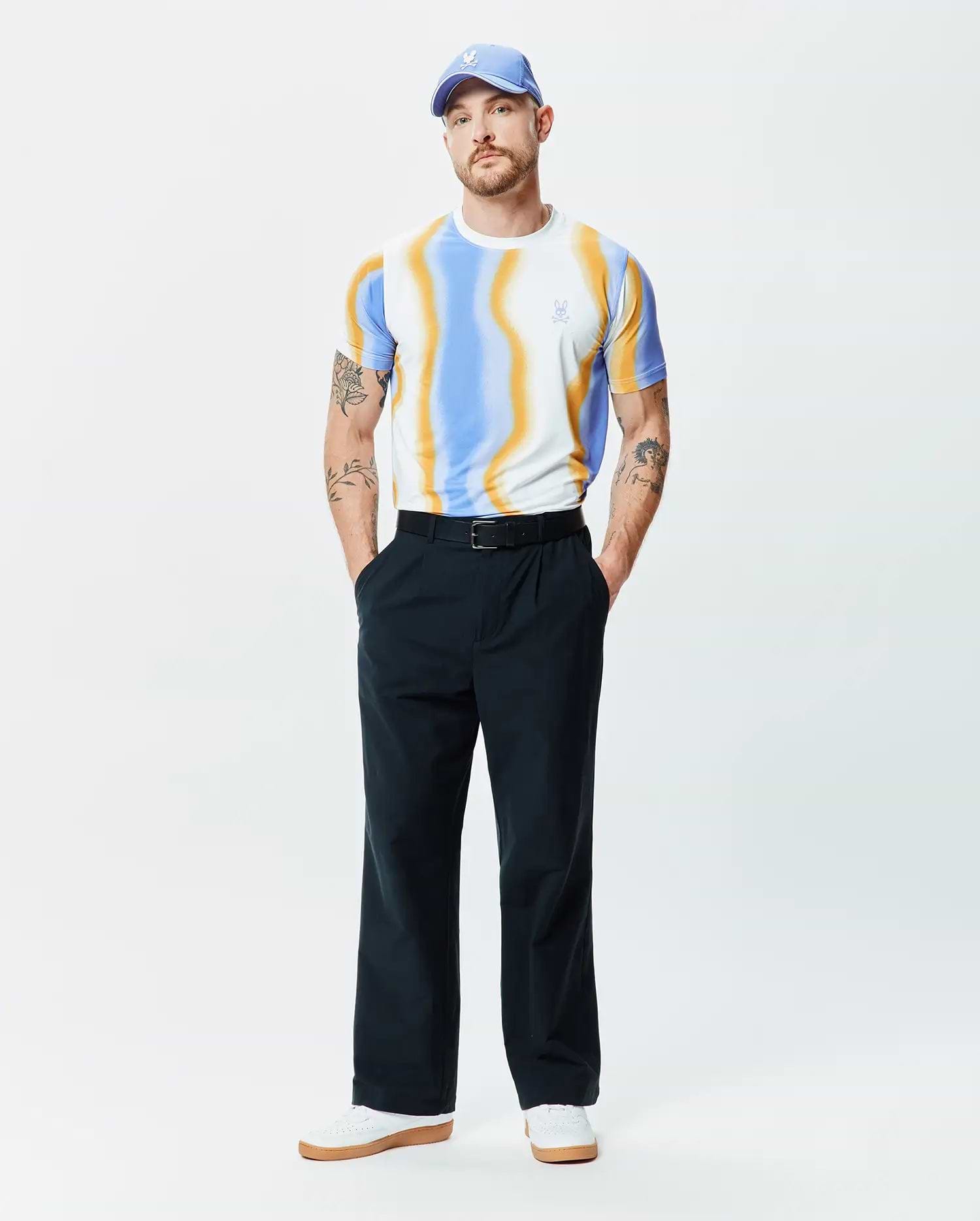 Mens Blaze Sport Tee featuring a classic fit, white jersey knit with bold wavy blue and orange stripes, and a small light blue Psycho Bunny skull logo on the left chest.