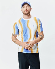 Mens Blaze Sport Tee, a slim fit performance jersey t-shirt featuring a vibrant white, blue, and orange swirling wave pattern with a small embroidered Psycho Bunny skull logo on the left chest.