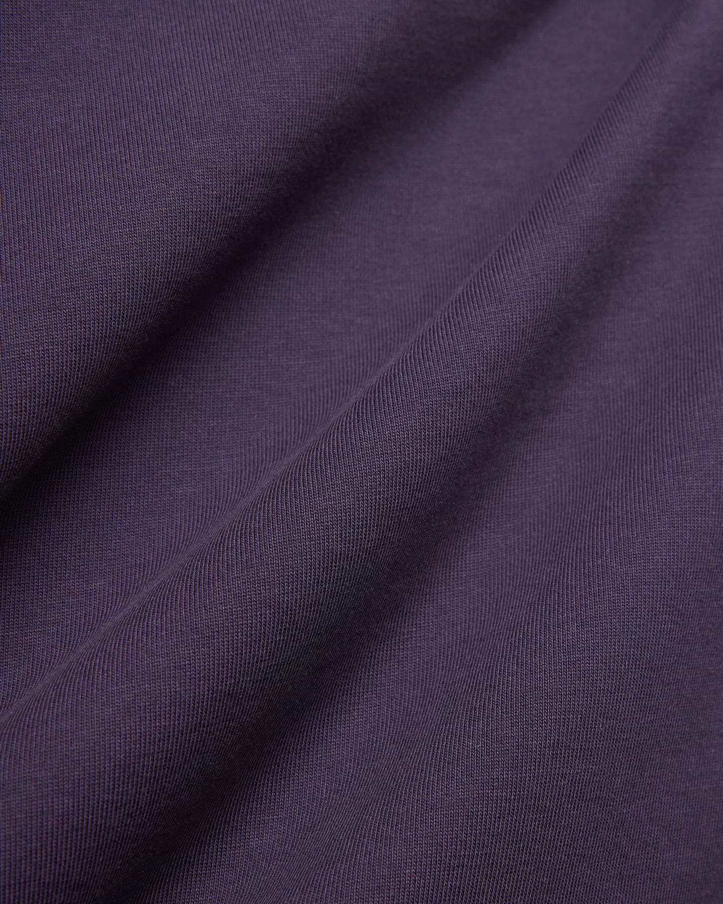 Dark Purple Mens Windcrest Relaxed Fit Tee fabric, featuring a soft, finely ribbed jersey knit texture with subtle vertical lines and gentle folds.