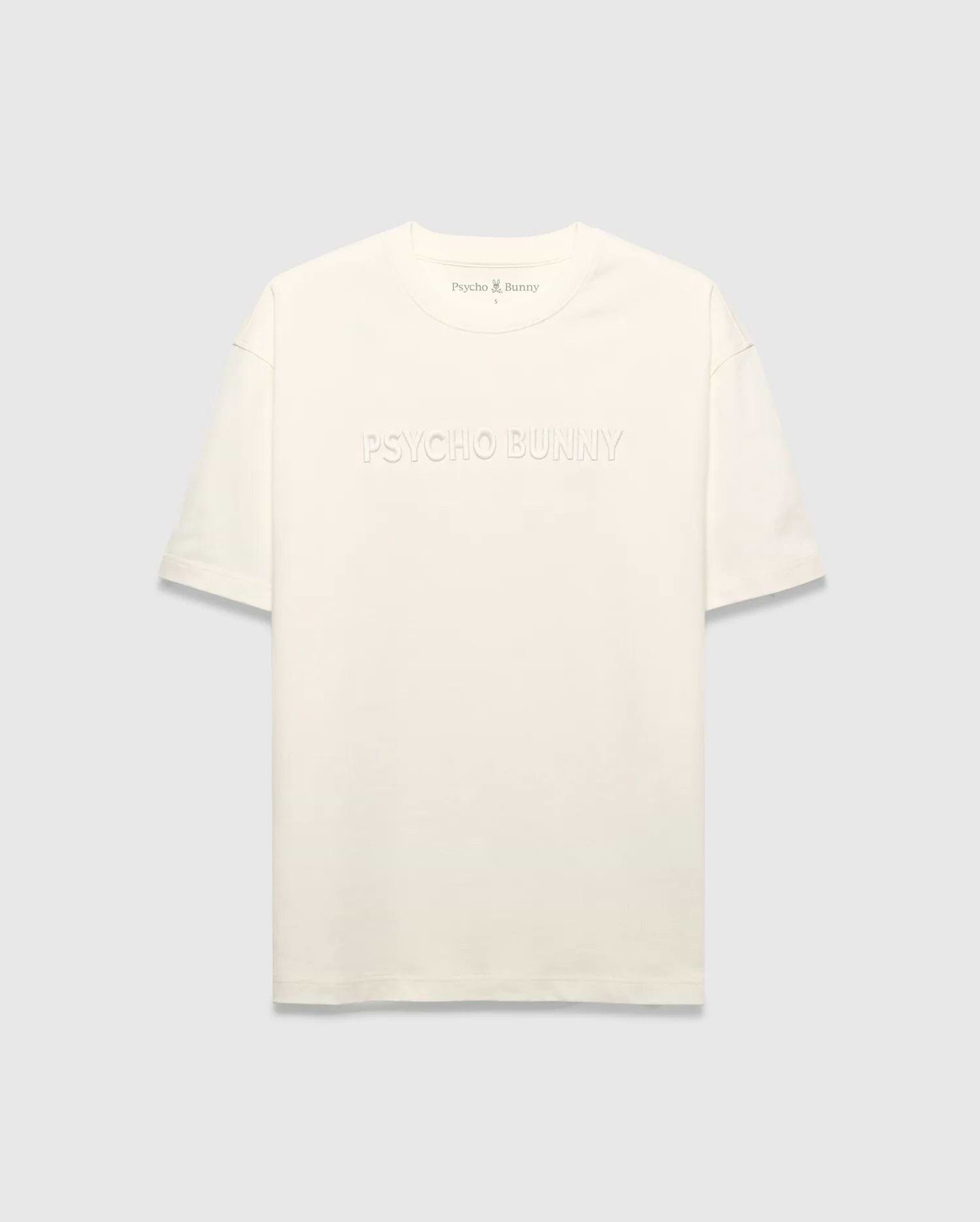 Mens Windcrest Relaxed Fit Tee in cream jersey, featuring a large tonal embossed PSYCHO BUNNY chest logo and a small embroidered bunny skull on the back neck. (5)