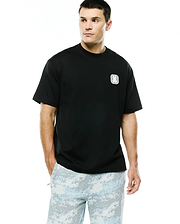 Men's Samson Oversized Bunny Tee in black jersey knit, featuring an embroidered white and silver Psycho Bunny skull logo on a textured square patch on the left chest. (1)
