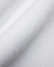 Men's Samson Oversized Bunny Tee, crafted from luxurious white jersey knit fabric with a fine, soft texture and subtle draping, reflecting Psycho Bunny's premium streetwear style and iconic bunny skull branding. (6)