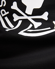Mens Santa Fe Bunny Graphic Tee, a black jersey knit t-shirt featuring a bold white graphic print of crossbones and partial Psycho Bunny logo text.