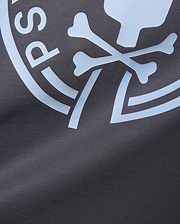 Mens Santa Fe Bunny Graphic Tee, a classic fit dark grey jersey knit t-shirt with a prominent pale blue Psycho Bunny skull and crossbones graphic print and PS lettering. (5)
