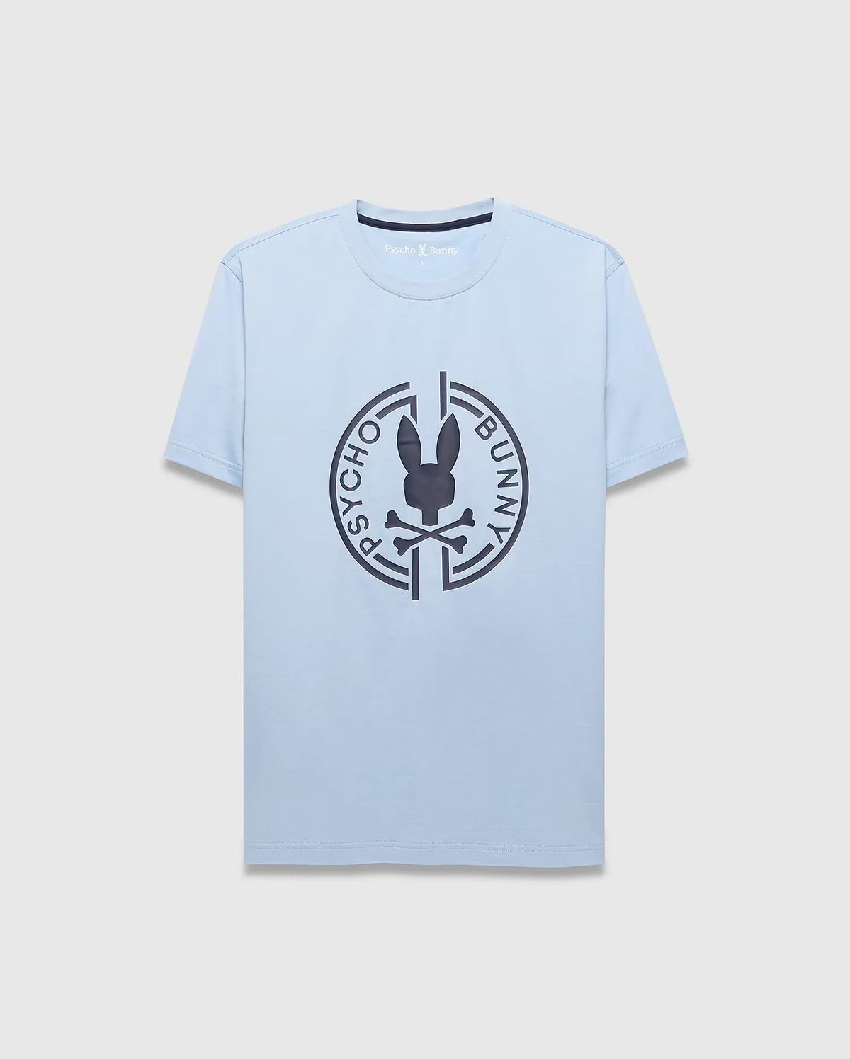 Mens Santa Fe Bunny Graphic Tee. Light blue jersey t-shirt with a classic fit, featuring a large dark grey circular chest graphic of the iconic Psycho Bunny skull logo and brand name. (1)