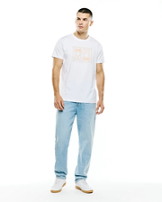 Mens Gold Coast Pima Cotton Graphic Tee: White classic fit Pima cotton jersey t-shirt featuring a large central orange outlined graphic of two Psycho Bunny skull logos, one with a bow tie, one with a regular tie, both within a rectangular frame.