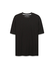 Black Mens Garry Relaxed Fit Tee featuring a subtle all-over embossed Psycho Bunny skull and crossbones pattern, textured jersey fabric, and white inner neckline trim.