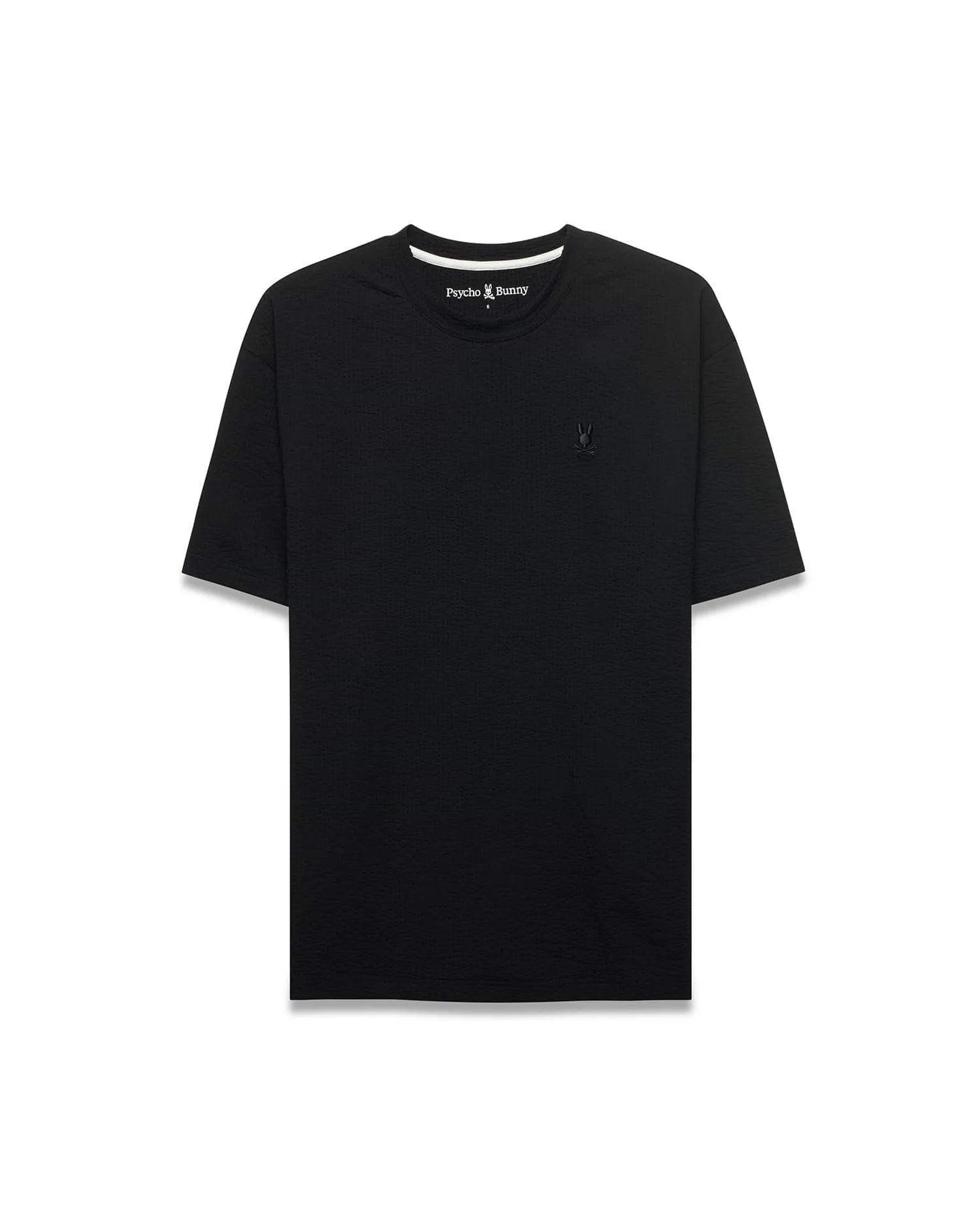 Black Mens Arlen Relaxed Seersucker Tee with subtle texture, featuring a small embroidered black Psycho Bunny skull logo on the left chest and white inner neckline trim.