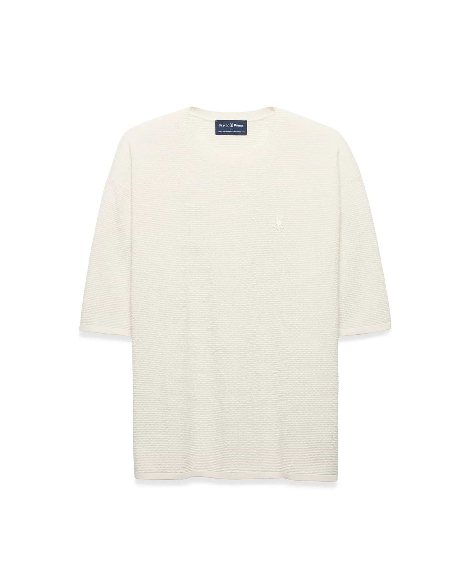 Mens Makai Textured Knit T-Shirt in cream, featuring a relaxed fit, subtle horizontal textured knit, and a small tonal embroidered Psycho Bunny skull logo on the left chest.